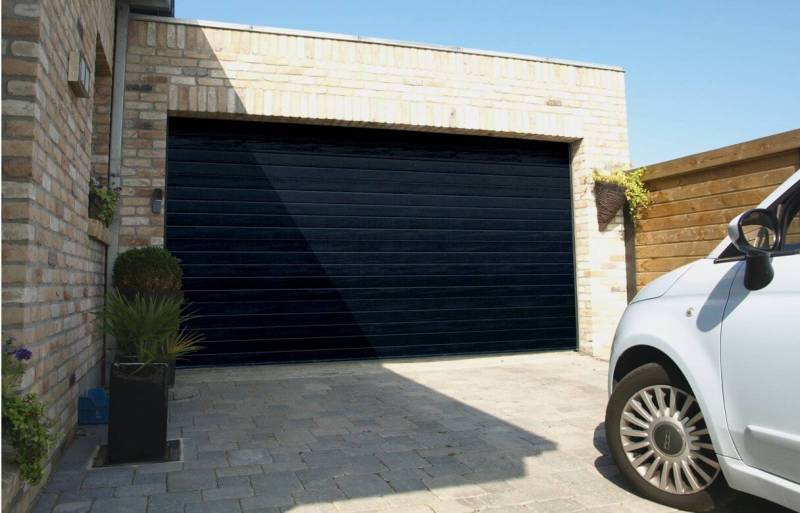 HERANVAL, spécialiste dans la vente et l'installation de portails, portes de garage et pergolas en Seine-Maritime